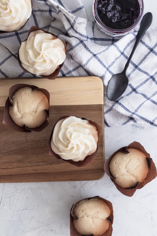 Fluffy white cupcakes  topped with creme fraiche frosting