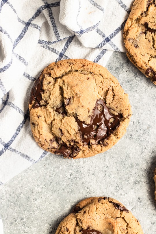 My favorite chocolate chip cookies have chewy centers with just the right amount of crispy edges, and all of it with puddles of dark chocolate throughout. Definitely a perfect version of a classic dessert. || Good Things Baking Co. #chocolatechipcookies #chocolatechip #chocolatedessert #cookies 