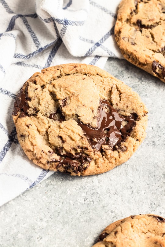 My favorite chocolate chip cookies have chewy centers with just the right amount of crispy edges, and all of it with puddles of dark chocolate throughout. Definitely a perfect version of a classic dessert. || Good Things Baking Co. #chocolatechipcookies #chocolatechip #chocolatedessert #cookies