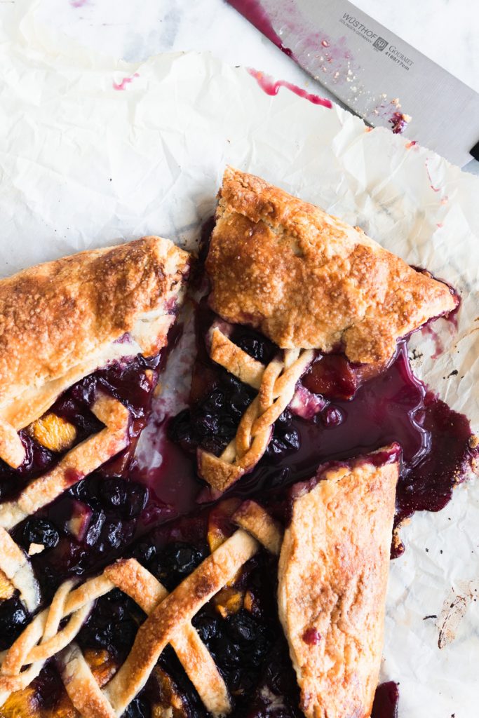 A Slice of Blueberry Peach Galette with a Lattice Top