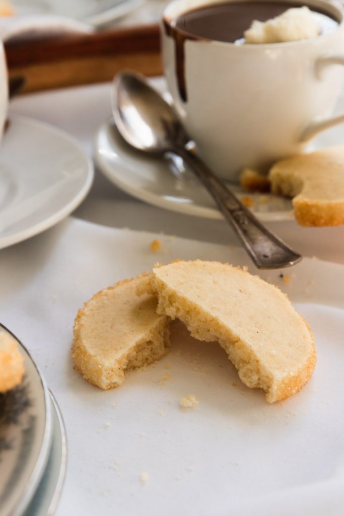 A delicate, crumbled vanilla french sable cookie