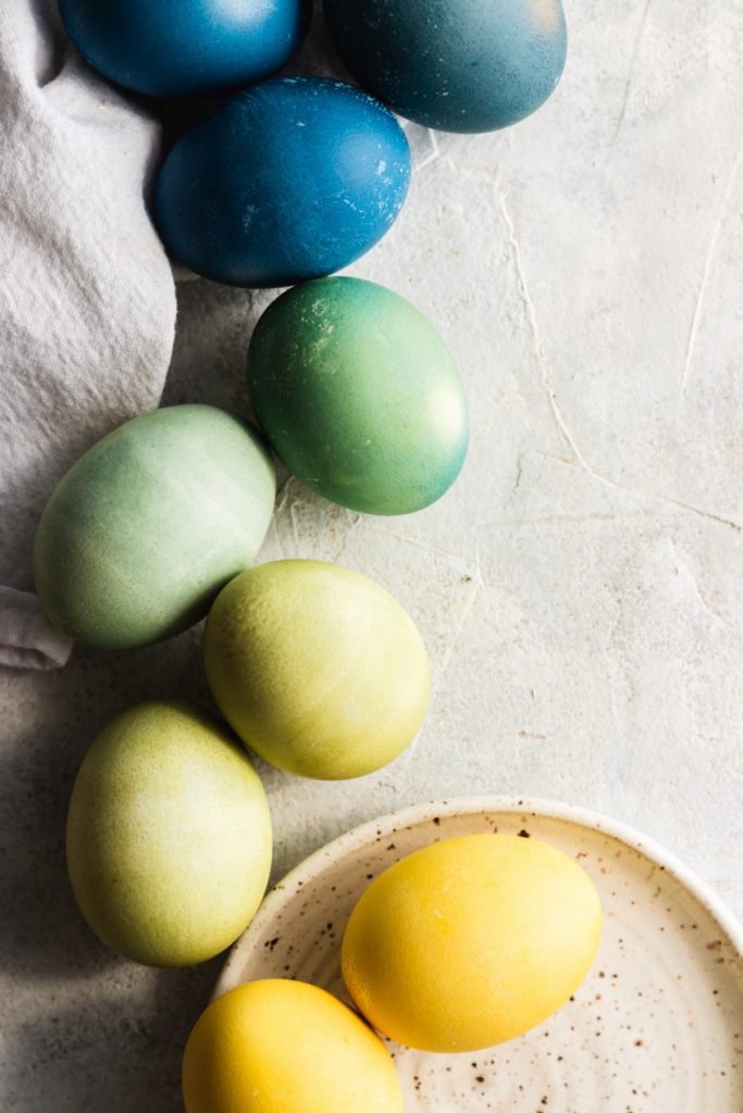 Green Easter eggs dyed naturally with turmeric and red cabbage
