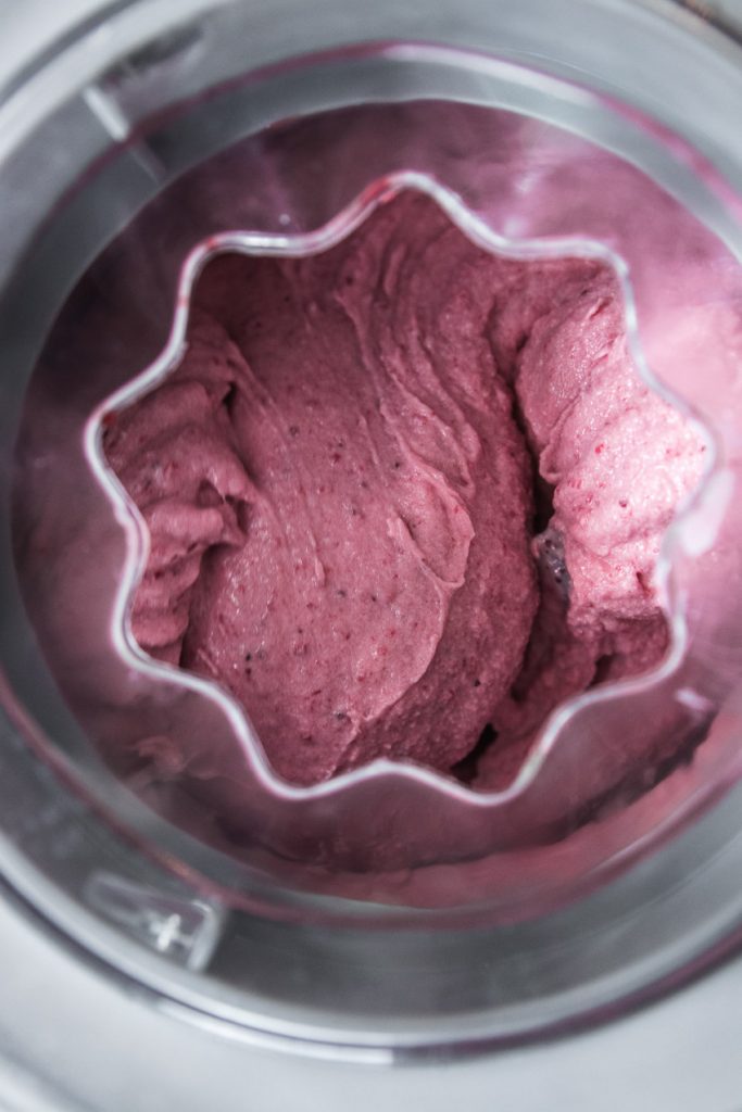 Churn together the strawberry puree and custard into a smooth creamy ice cream.