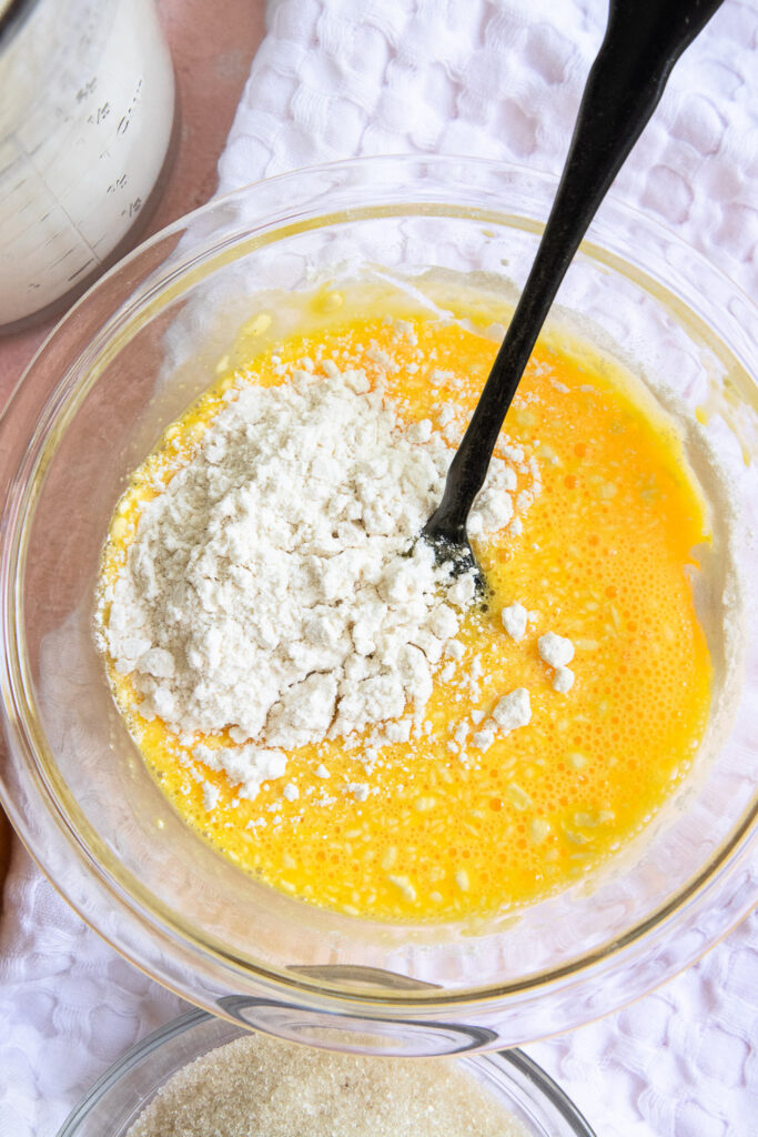 Whisk the flour into the egg yolks and milk until smooth.