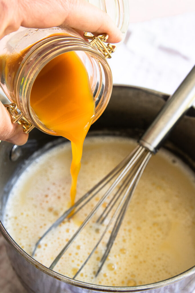 Add the passion fruit puree to the custard.