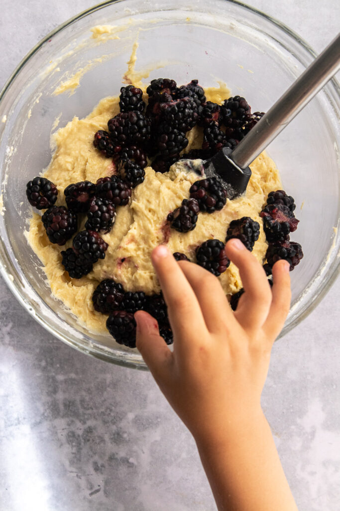 Fold the blackberries into the batter.