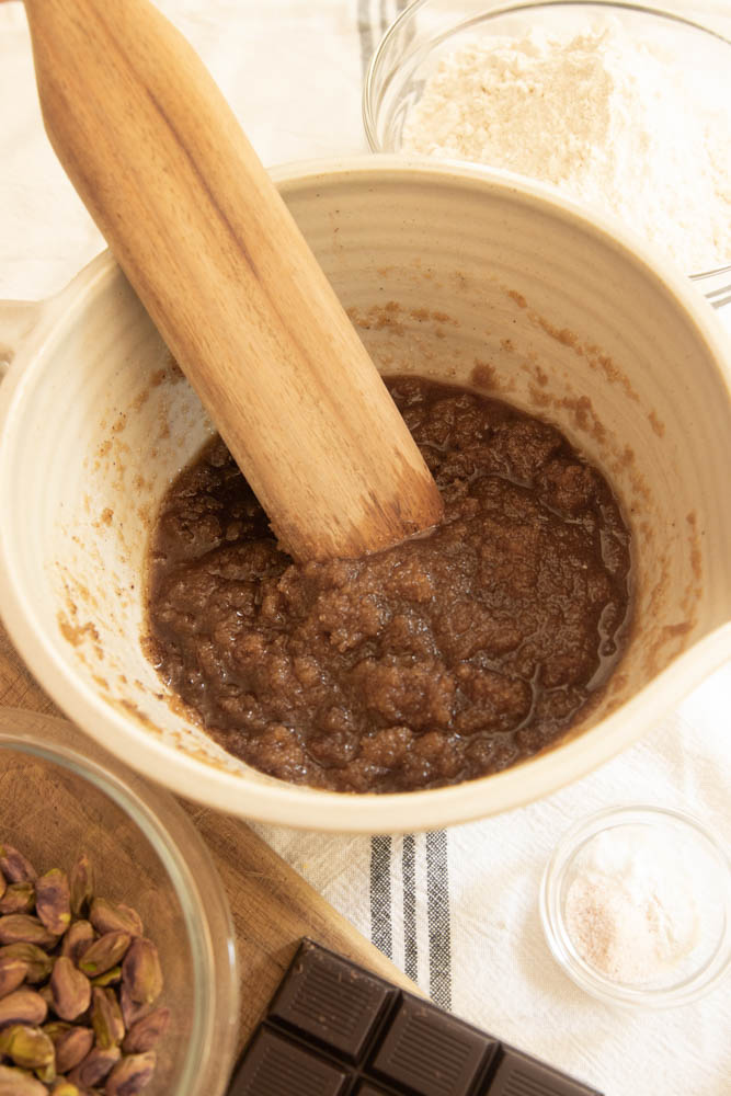 Stirring together the browned butter and sugars.