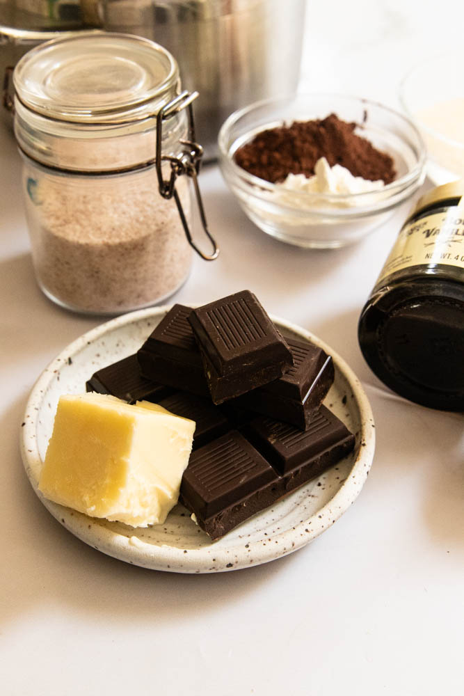 The dark chocolate and butter, added to the cream filling after it's been cooked.