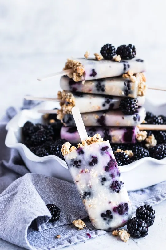 A stack of Blackberry Granola Breakfast Popsicles