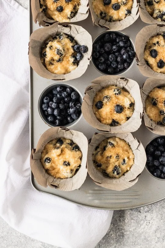 Press extra blueberries into the tops of your muffins to make them extra pretty! || Good Things Baking Co.