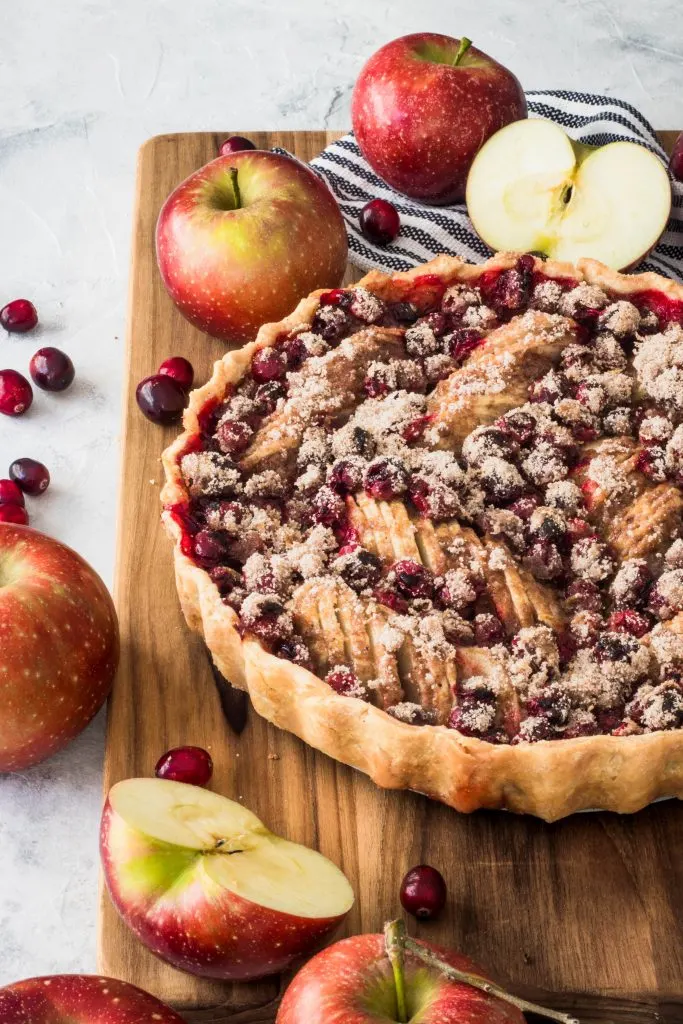 Apple Cranberry Pie has a hint of orange and spices to give this pie a perfect blend of unique and traditional flavors. || Good Things Baking Co. #goodthingsbaking #applepie #thanksgivingpie #applecranberry #pie #appledessert #pierecipe #fallpie #pieinspiration