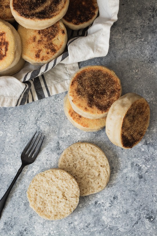 A stack of toasty, fresh sourdough English Muffins