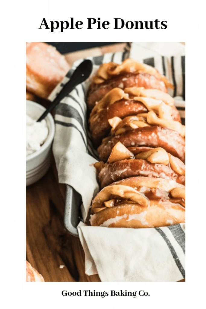 Soft yeast donuts stuffed with spiced apple filling make these Apple Pie Donuts the ultimate fall treat! Serve with whipped cream and an extra dusting of cinnamon. || Good Things Baking Co. #goodthingsbaking #donuts #applepie #fallbaking #doughnuts