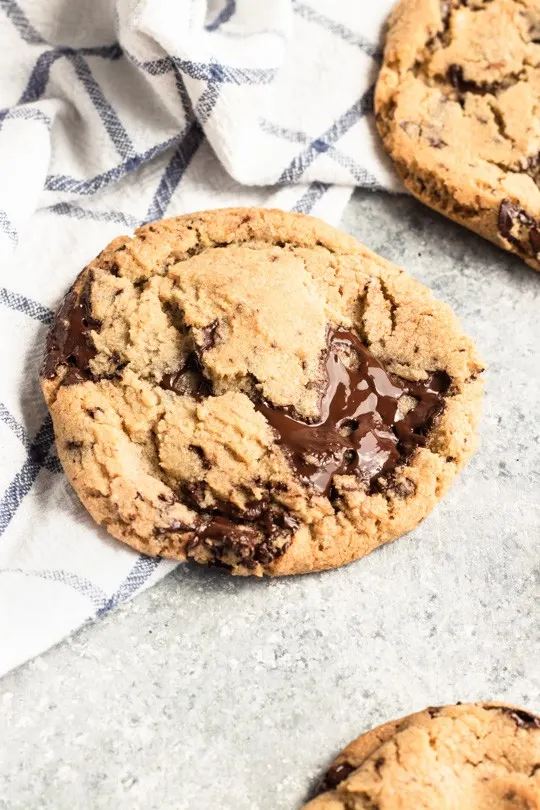 My favorite chocolate chip cookies have chewy centers with just the right amount of crispy edges, and all of it with puddles of dark chocolate throughout. Definitely a perfect version of a classic dessert. || Good Things Baking Co. #chocolatechipcookies #chocolatechip #chocolatedessert #cookies 