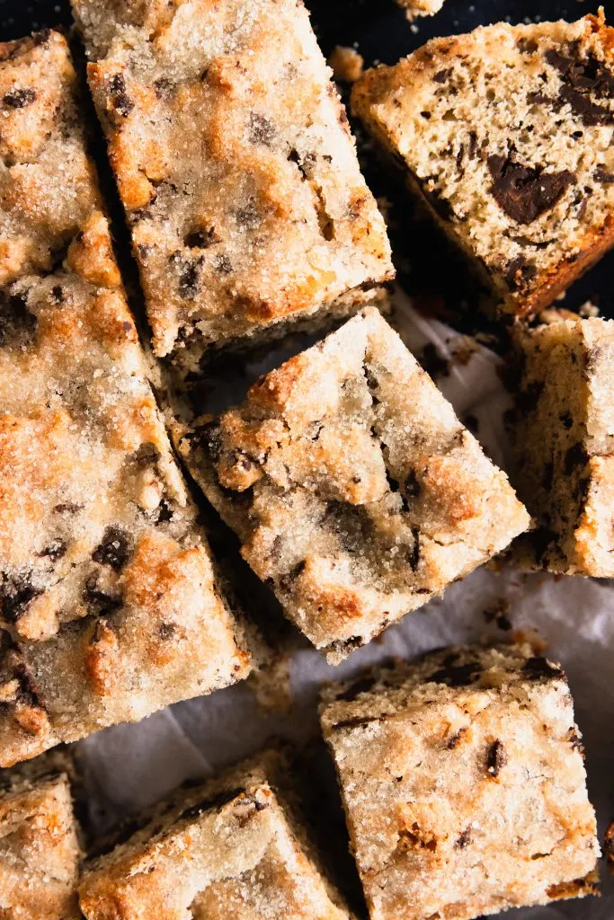 Crusty sugar topped squares of Chocolate Chunk Snack Cake.