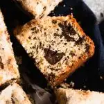 A piece of Chocolate Chunk Snack Cake with a crusty sugar topping.