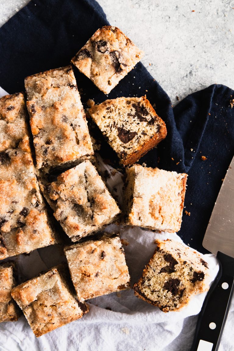 Crusty sugar topped squares of Chocolate Chunk Snack Cake.