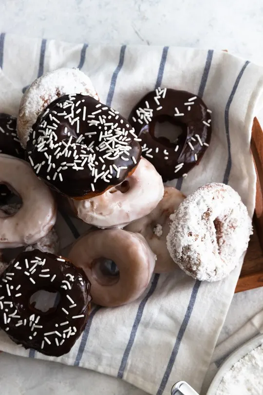 Sourdough donuts on a tray.