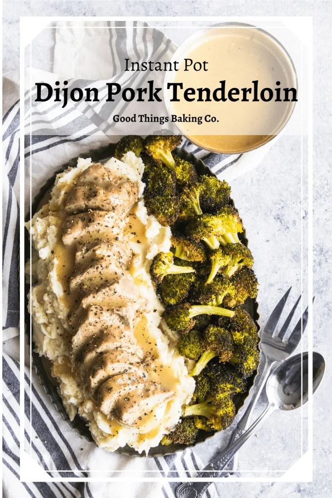 A platter of Dijon Pork Tenderloin piled on mashed potatoes and roasted broccoli on the side.