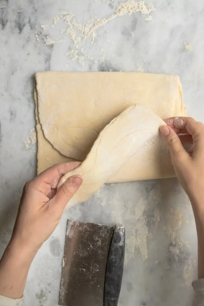 Folding the dough to roll