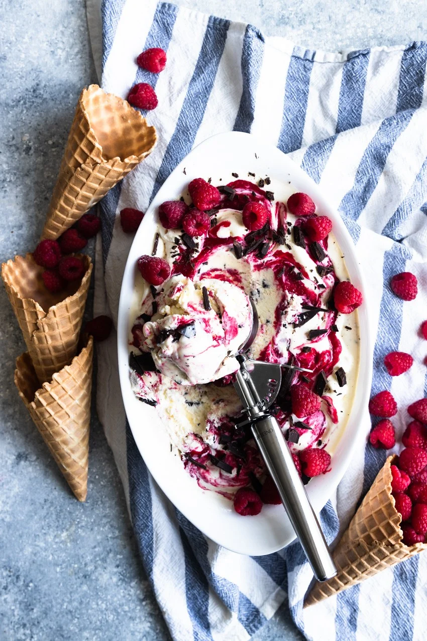 A dish of raspberry and chocolate swirl ice cream