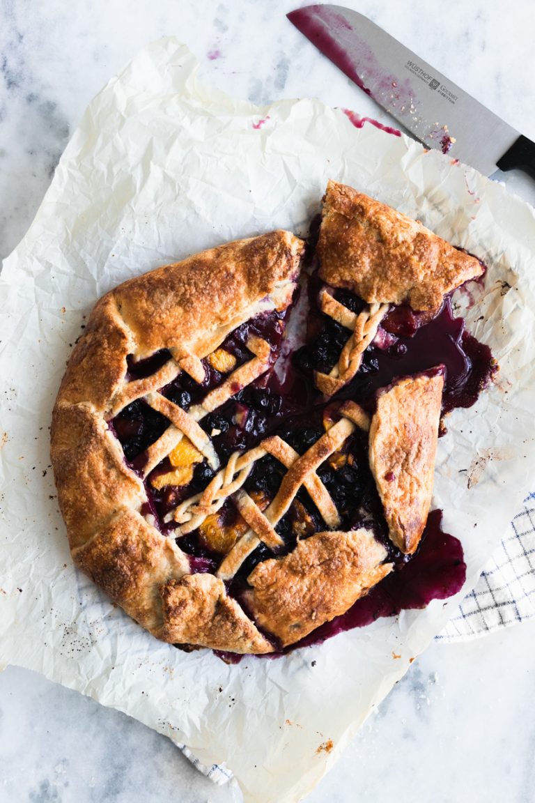 A Slice of Blueberry Peach Galette with a Lattice Top