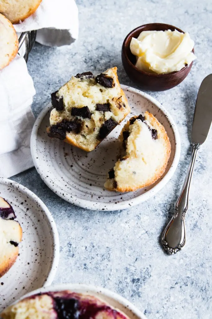 A sourdough muffin full of chocolate chunks