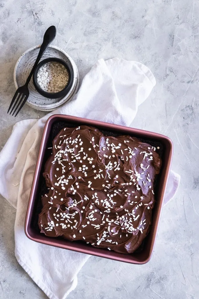 Easy Sourdough Chocolate Cake with Fudge Frosting and White Sprinkles on Top