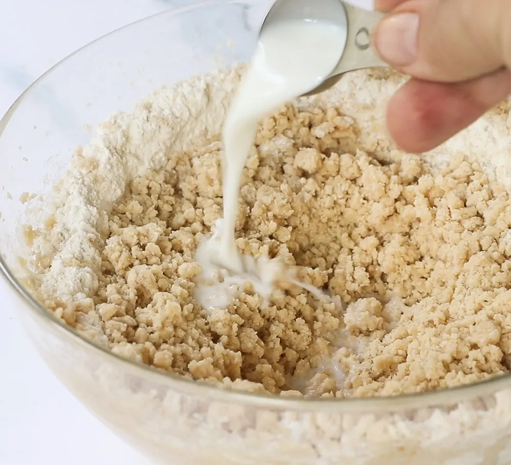 Stir in milk, a little bit at a time, until you have a cookie dough consistency.