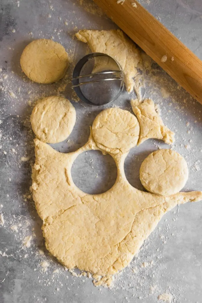 Use a round biscuit cutter to cut the biscuits out.