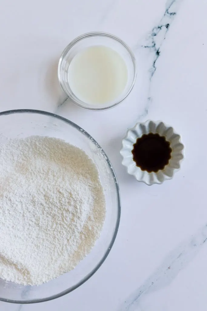 The glaze ingredients--powdered sugar, milk, and vanilla extract.
