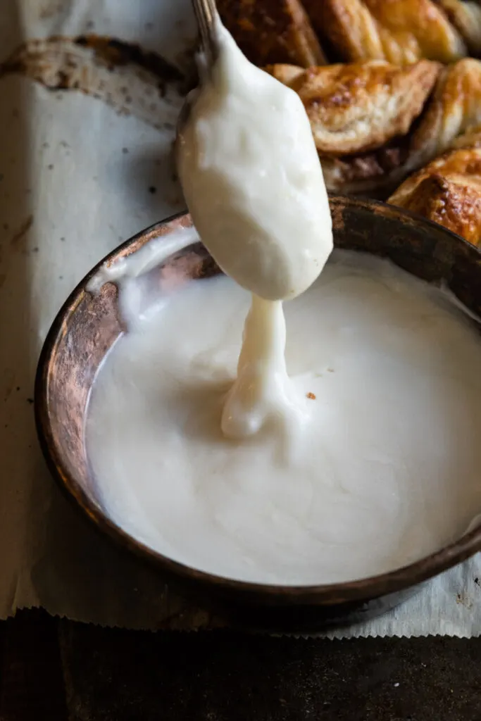 Make the frosting a consistency that can be drizzled but isn't runny.