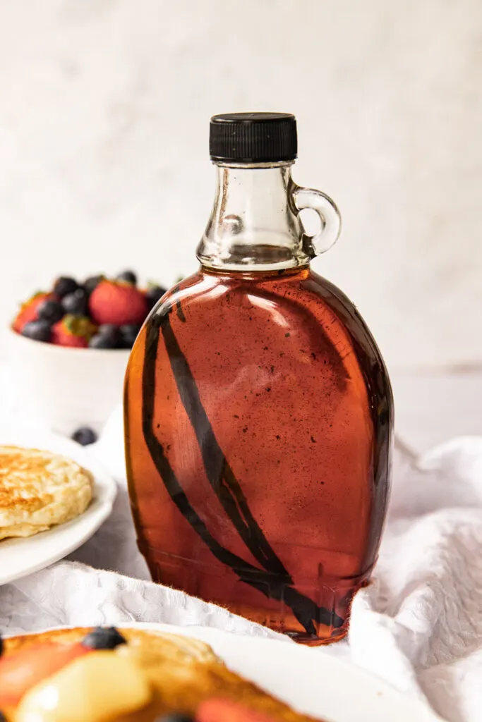 A bottle of maple syrup infused vanilla beans.