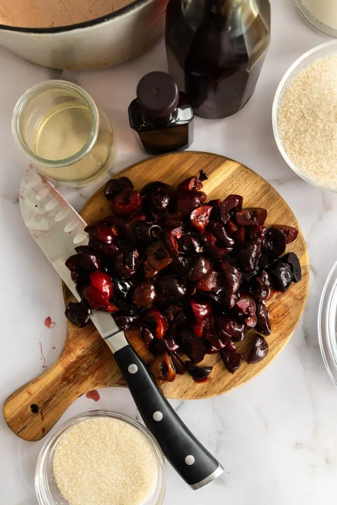 Chop the cherries into small pieces before cooking them.