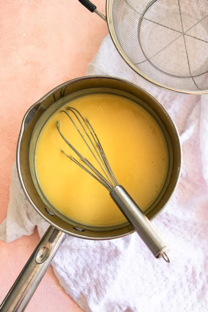 Cook the custard over medium-low heat, whisking constantly, until lit has thickened.
