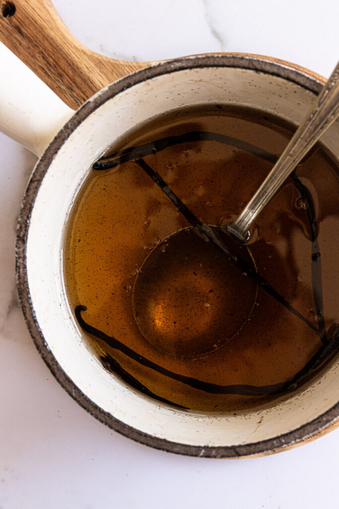 Vanilla Bean Simple Syrup in a small pot.