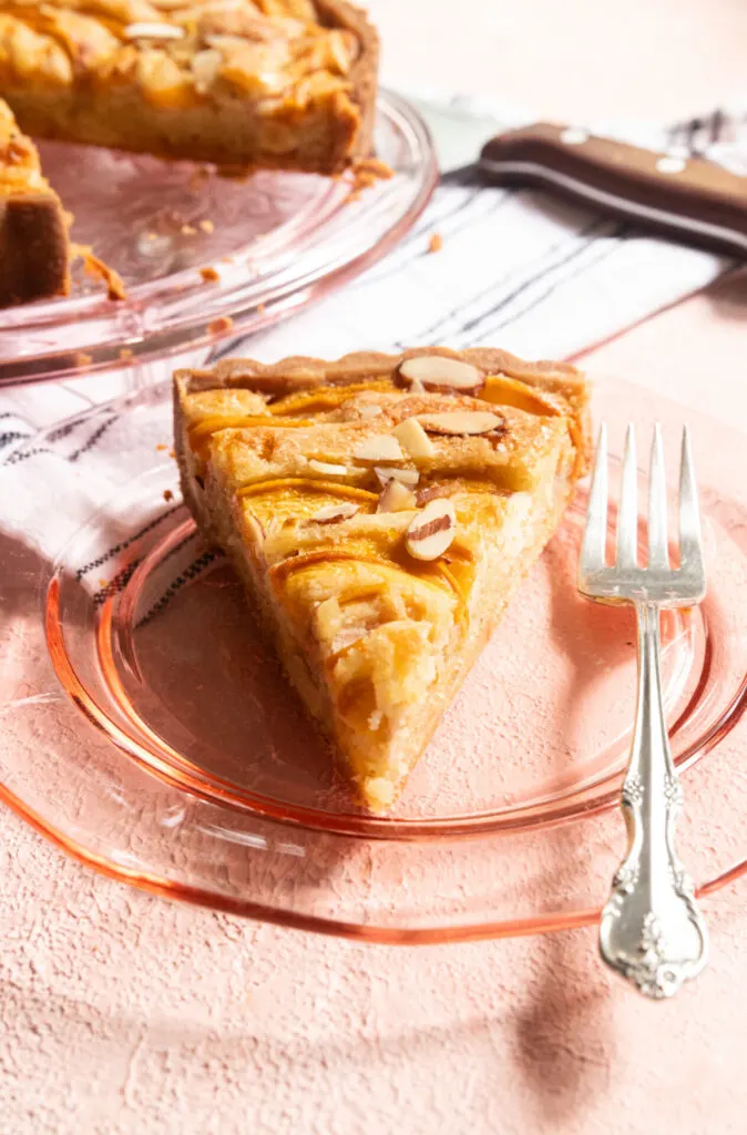 A slice of peach almond tart.