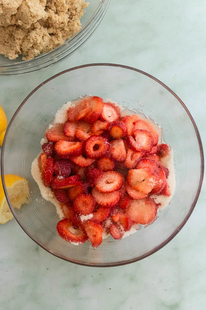 As the sliced strawberries sit in sugar and lemon juice, they become juicy.