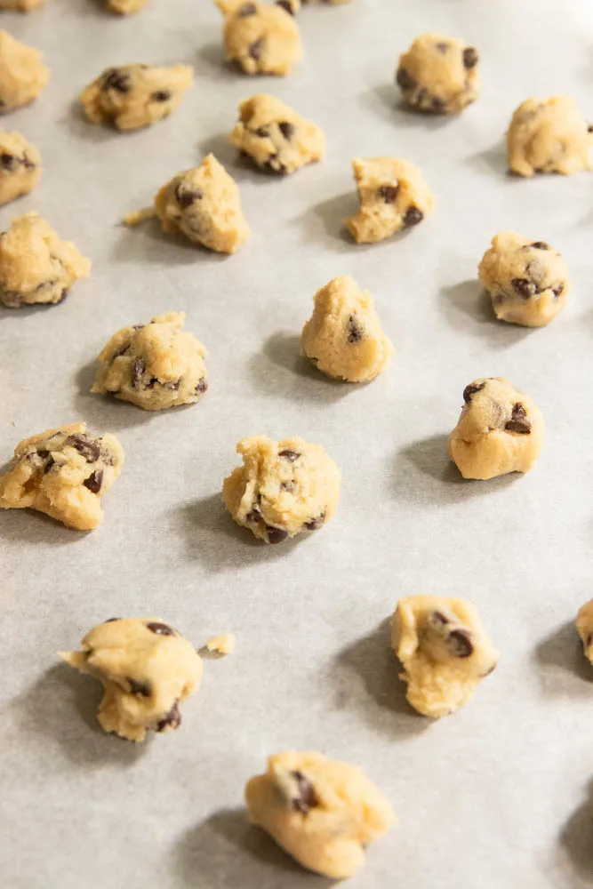 Small bits of cookie dough, ready to be baked.